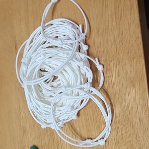 Package Of 50+ White Adjustable Bracelet